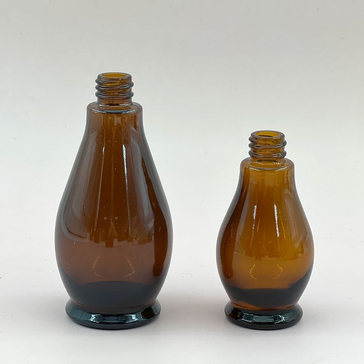 High quality 10ml 20ml 30ml 50ml 100ml amber single gourd glass essential oil bottle with aluminium dropper