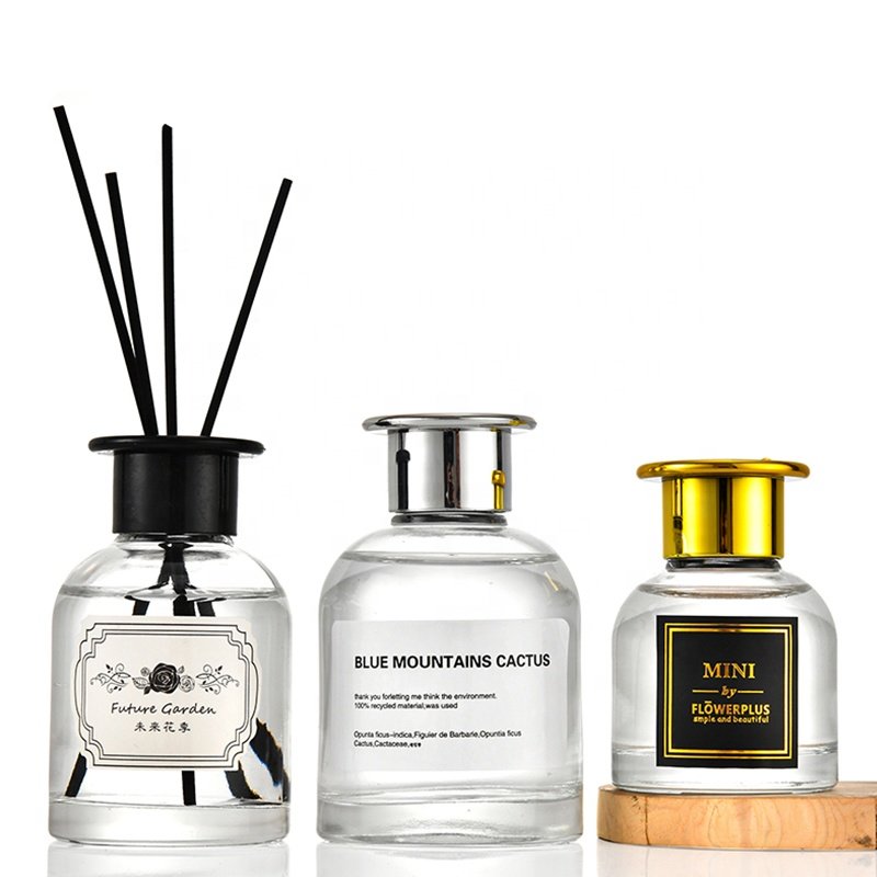 Fragrance various shapes of empty diffusion glass bottle with rattan sticks and sola flowers for home decoration