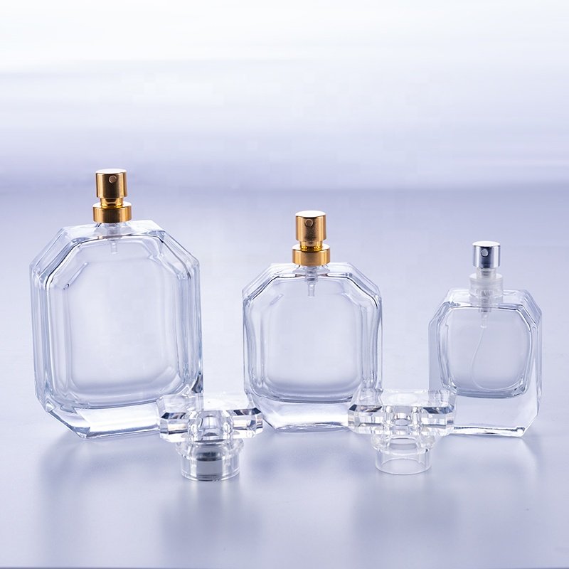 High quality empty transparent polyhedral flat crimp 50 ml glass perfume bottle