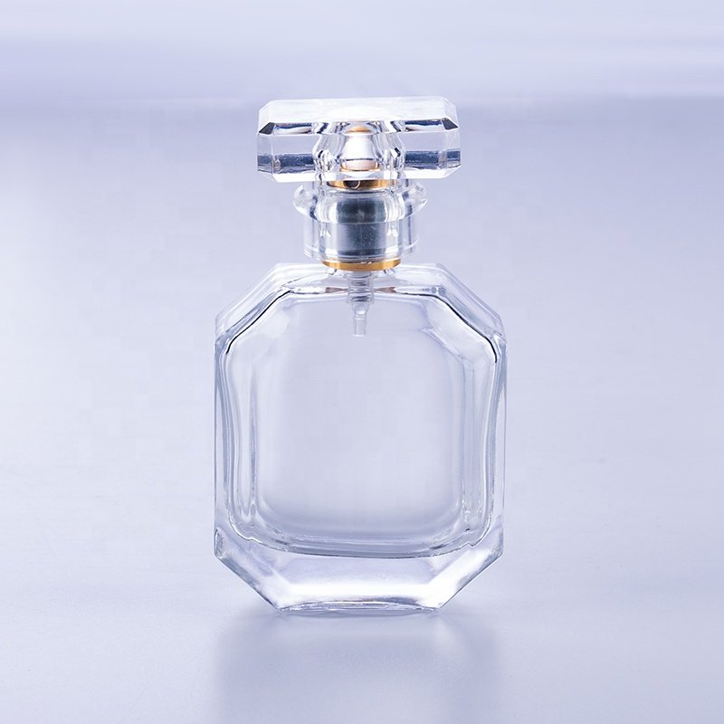High quality empty transparent polyhedral flat crimp 50 ml glass perfume bottle