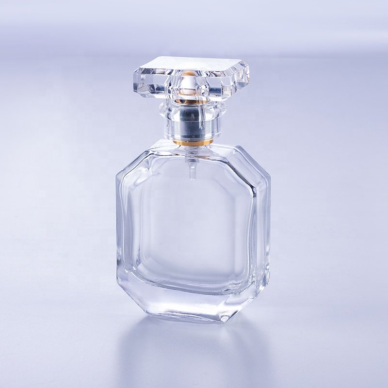 High quality empty transparent polyhedral flat crimp 50 ml glass perfume bottle
