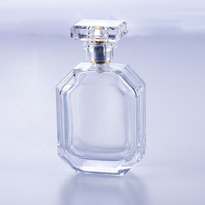 High quality empty transparent polyhedral flat crimp 50 ml glass perfume bottle