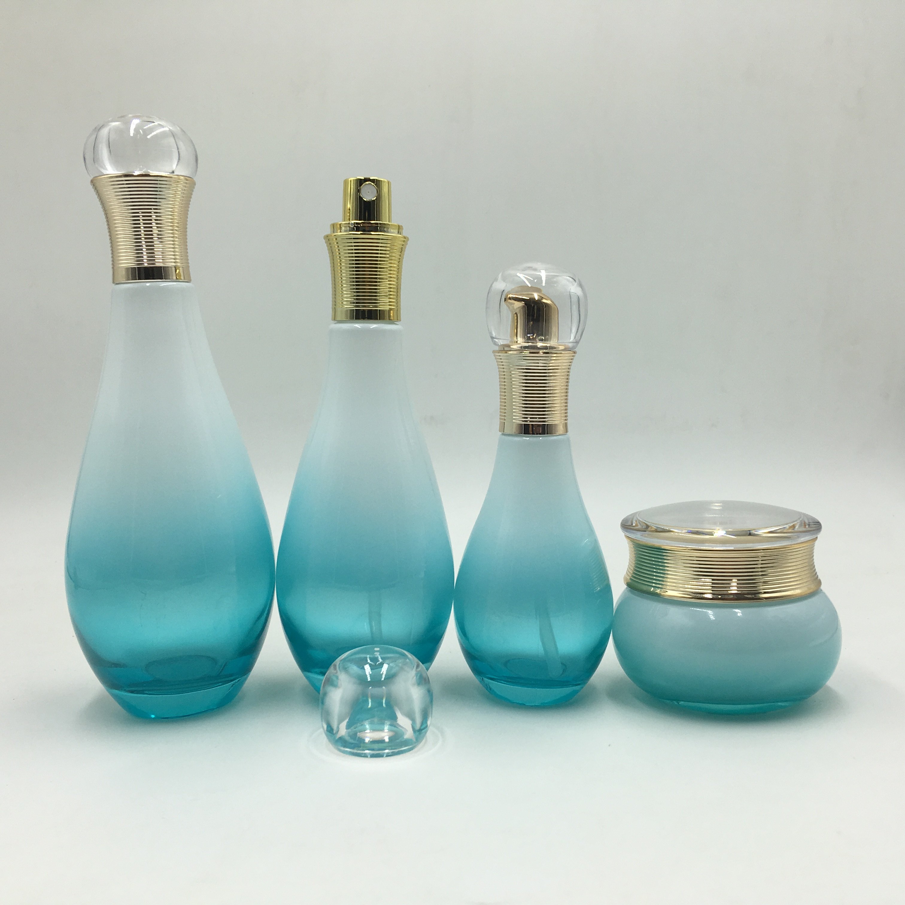 Customized cosmetic glass bottles Spray pump bottle cream jar Customized cosmetic packaging