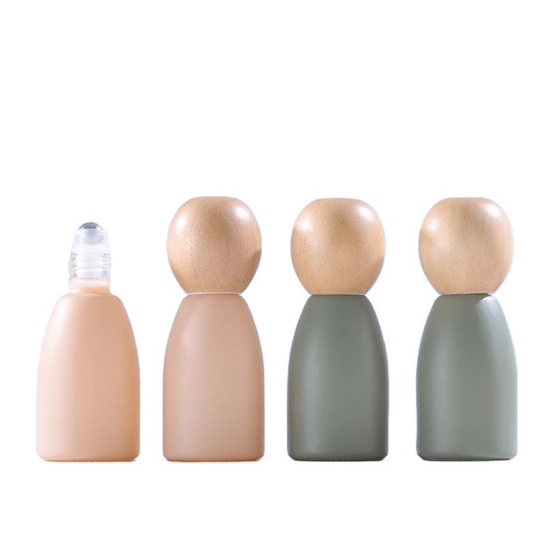 Wholesale custom 12ml Essential Oil Morandi Colors Roller On Glass Bottle For Perfume Roll-On Bottle With Beech Wood Lid