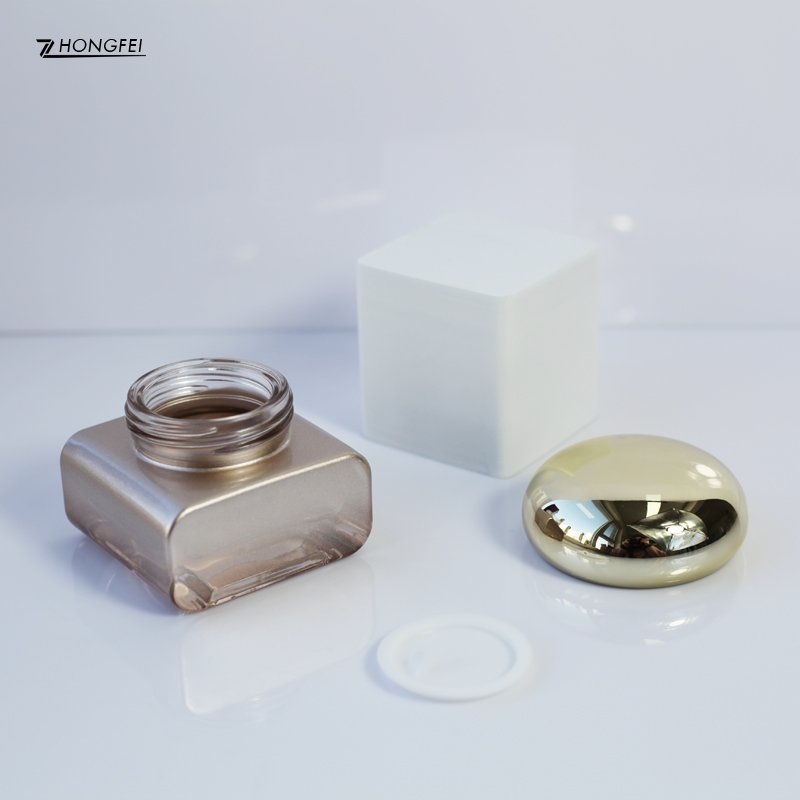 Luxury square matte glass designer cosmetic packaging 30g 50g 30ml 50ml with gold caps lotion pump serum bottle spray bottle
