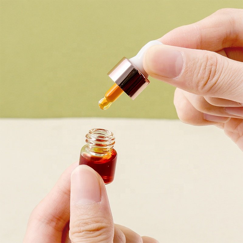 essional oil dropper glass bottle 2024 new arrival empty round RTS clear skin care serum 1ml dropper bottle cosmetic packaging