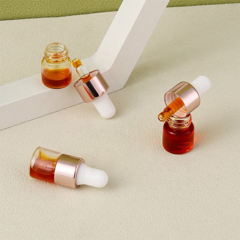 essional oil dropper glass bottle 2024 new arrival empty round RTS clear skin care serum 1ml dropper bottle cosmetic packaging