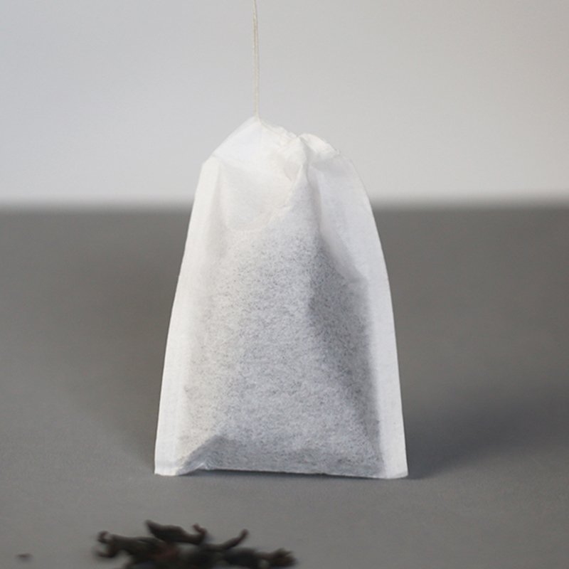 Wholesale right angle design degradable biodegradable food grade paper teabags packaging for tea bags with drawstring