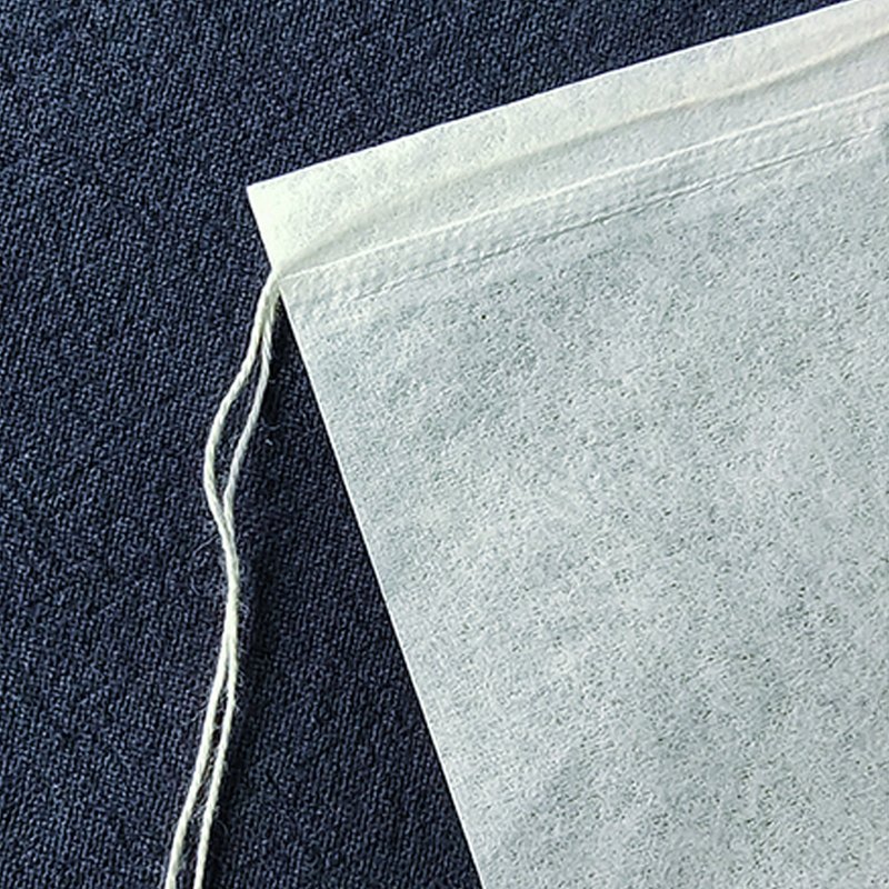 Wholesale right angle design degradable biodegradable food grade paper teabags packaging for tea bags with drawstring