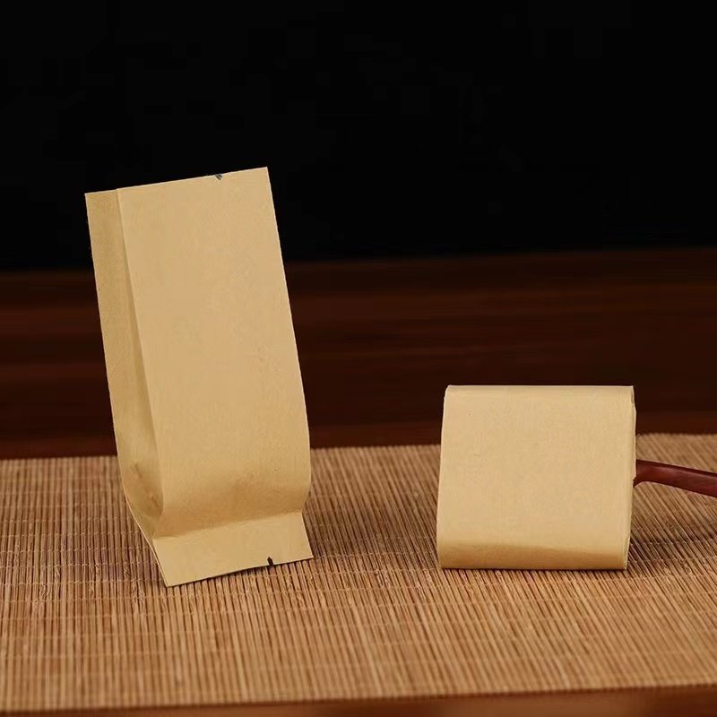 Wholesale Tea Aluminized Kraft Paper Bag Self-supporting Self-sealing Food Packaging Bag Kraft Paper Inner Aluminum Foil Bag