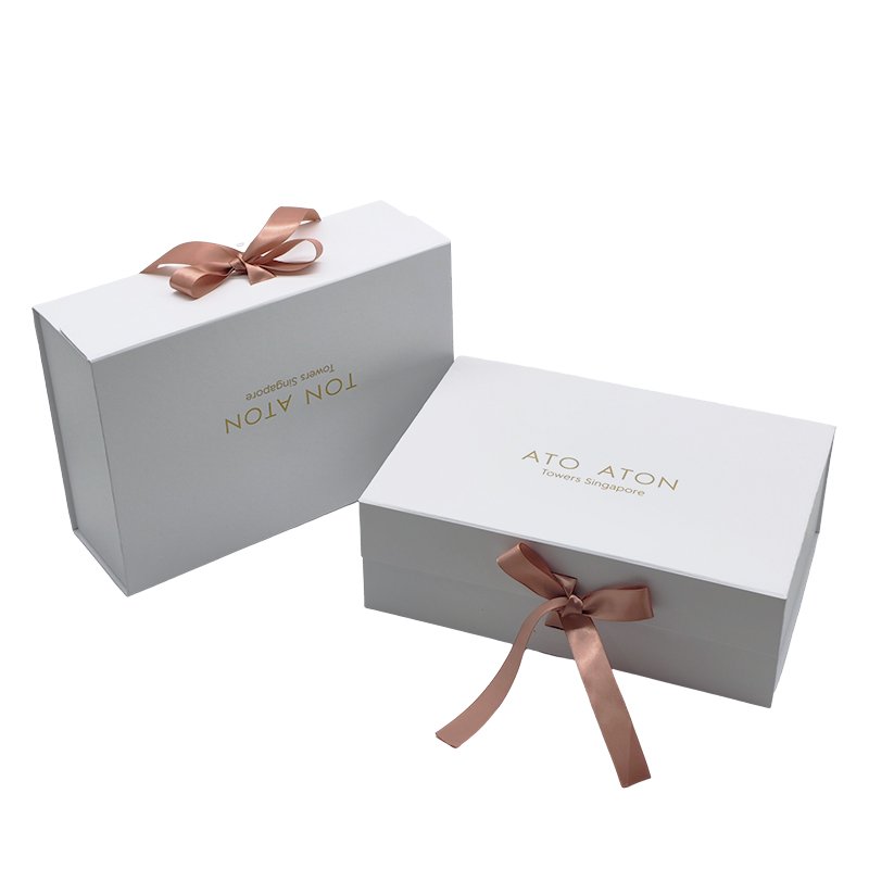 Custom Luxury White Magnet Flap Clothing Paper Box Foldable Magnetic Closure Gift Boxes With Rose Gold Ribbon