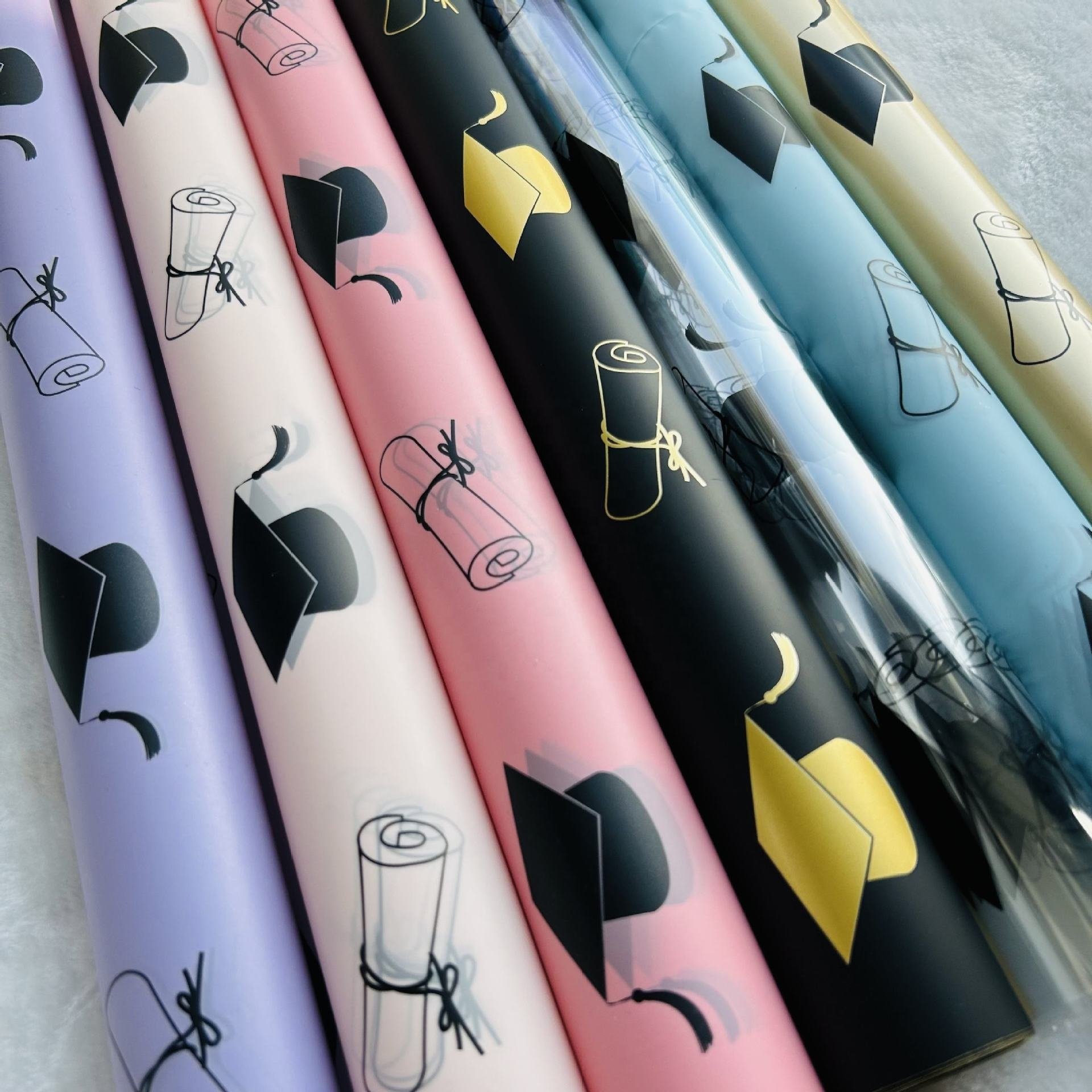 Manufacturer wholesales student graduation colorful flower wrapping paper with scroll and top hat patterns