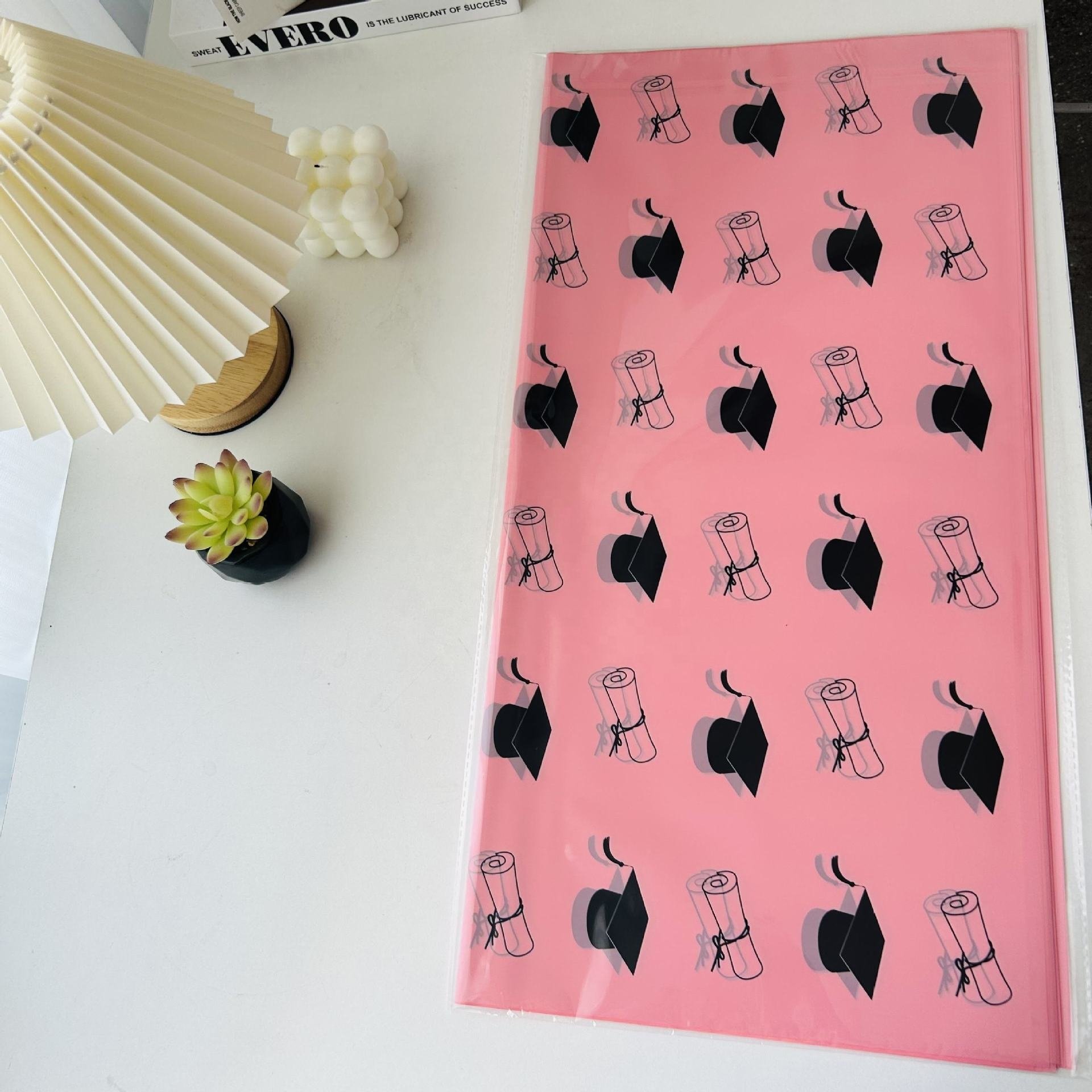 Manufacturer wholesales student graduation colorful flower wrapping paper with scroll and top hat patterns