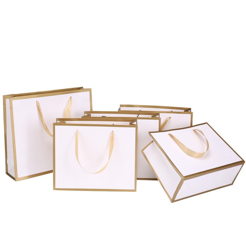 Wholesale Luxury Black Shoes Clothes packaging Paper Bags Printed Custom Logo Clothing Shopping Gift Jewelry Wine Paper Bag