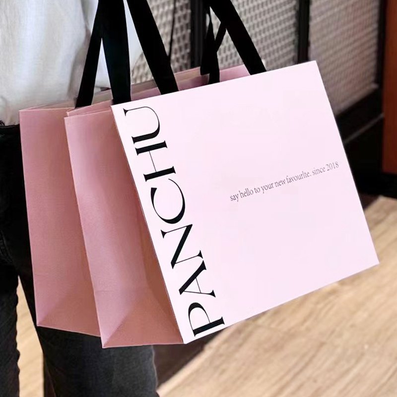 Luxury Custom Pink Retail Boutique Shopping Paper Gift Bag Cardboard Packaging Bags With Your Own Logo Print Handle