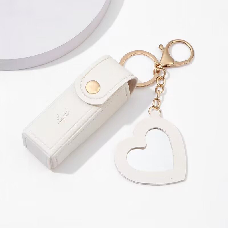 Fashion trend Portable key chain lipstick Case bag Heart-shaped mirror Cosmetics bag Leather mini storage case