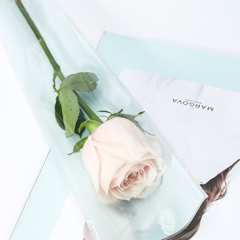 Wholesale OPP plastic flower packaging paper thicken single rose flower sleeve