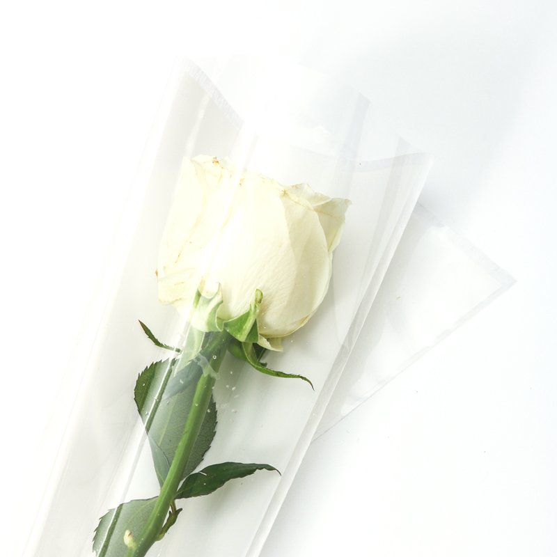 Wholesale OPP plastic flower packaging paper thicken single rose flower sleeve