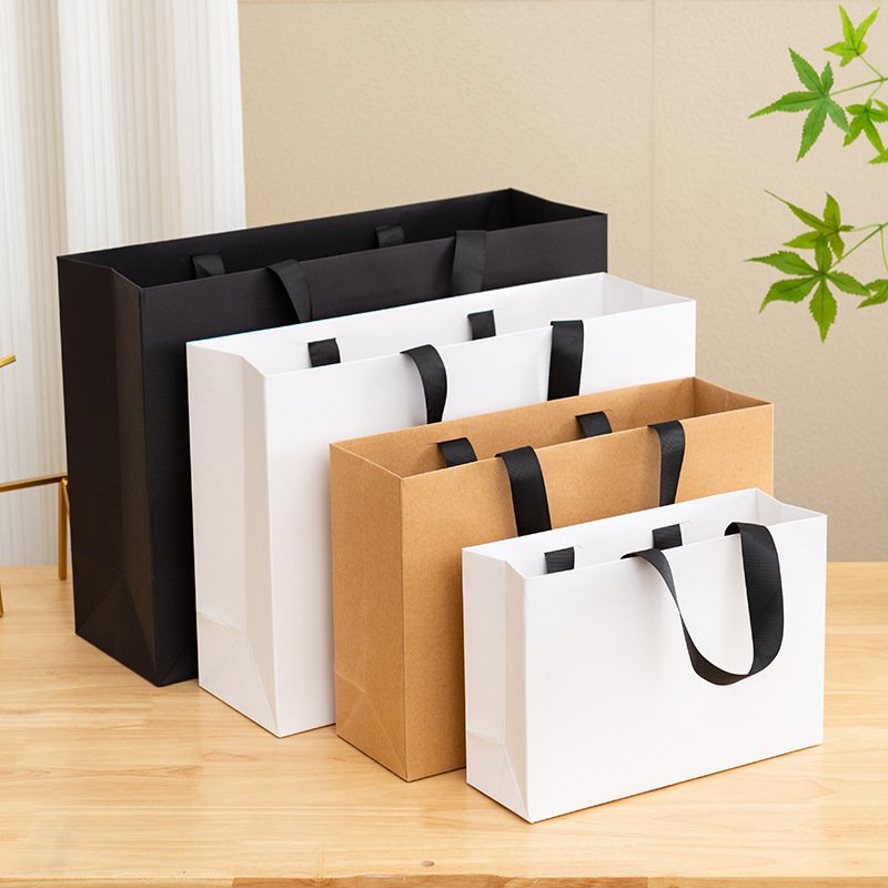 News Simple Birthday Gift Bag Shopping Bag for Clothing Paper Bag Thread Rope Packaging wholesales