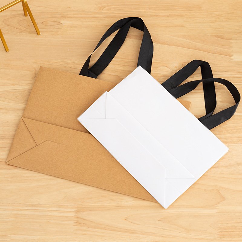 News Simple Birthday Gift Bag Shopping Bag for Clothing Paper Bag Thread Rope Packaging wholesales
