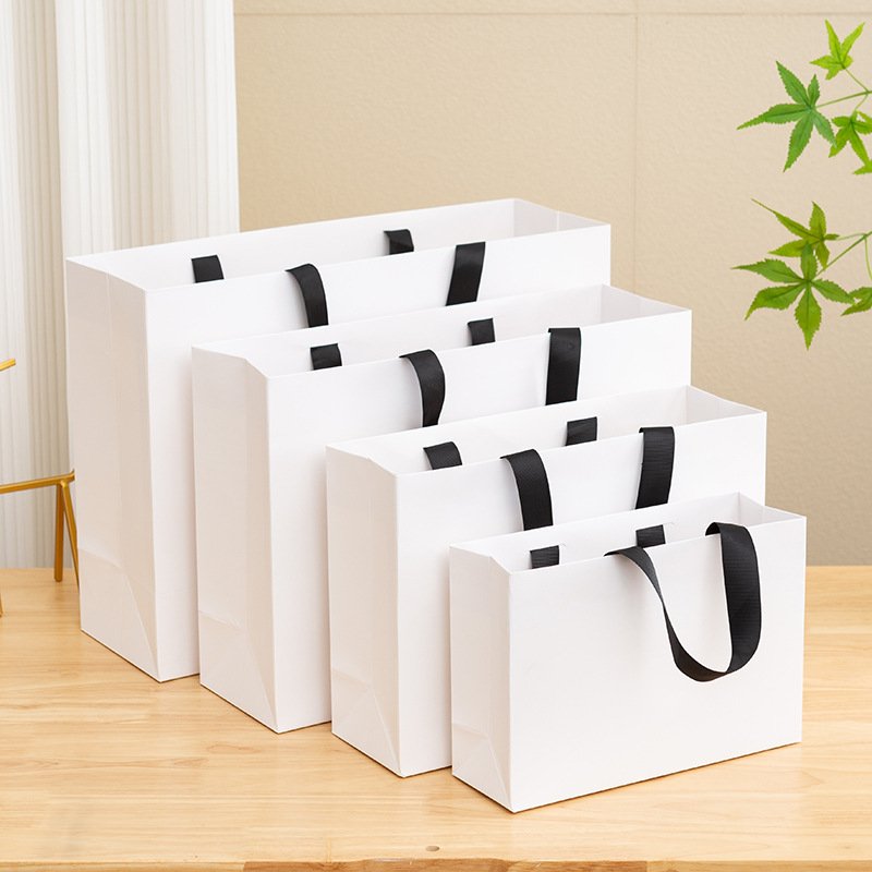 News Simple Birthday Gift Bag Shopping Bag for Clothing Paper Bag Thread Rope Packaging wholesales