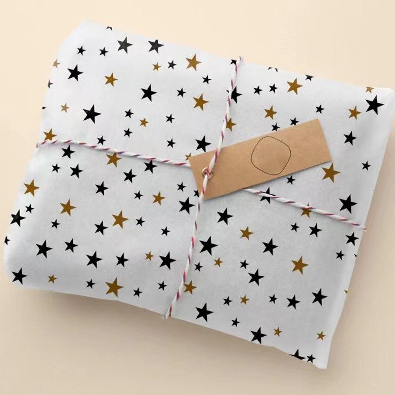 Guangzhou factory custom foil stamping tissue paper wrapping paper for clothing packaging