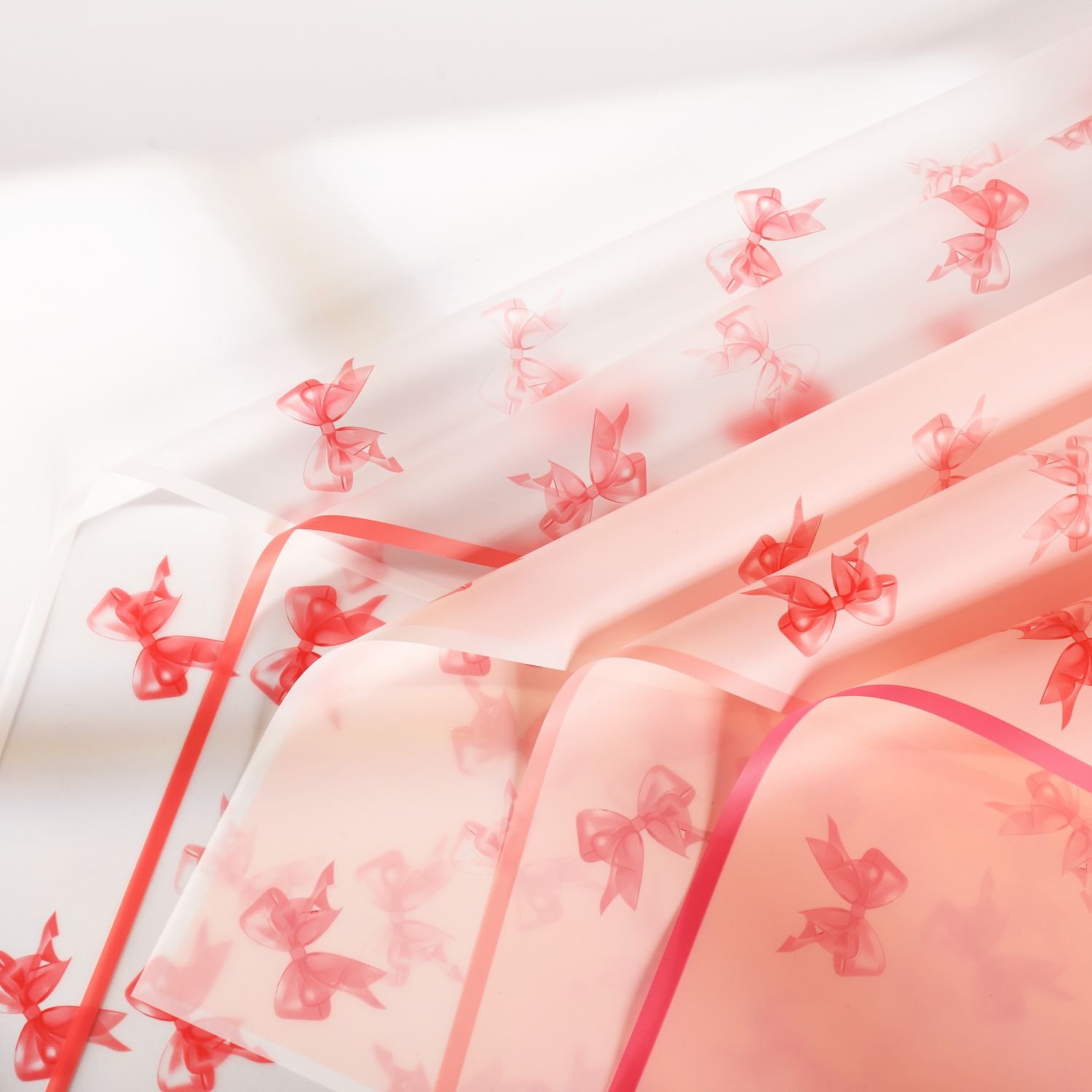 2024 New Arrival 58*58cm/pcs Bowknot Bowtie Design Printed Flower Wrapping Paper Plastic Waterproof Flower Packaging Paper