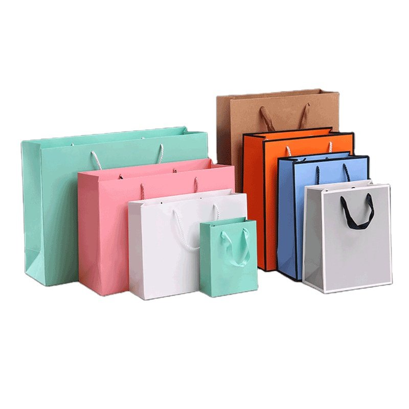 Wholesale Custom Printed Brand Logo Luxury Gift Pink White Black Shopping Packaging Paper Bag With Handles