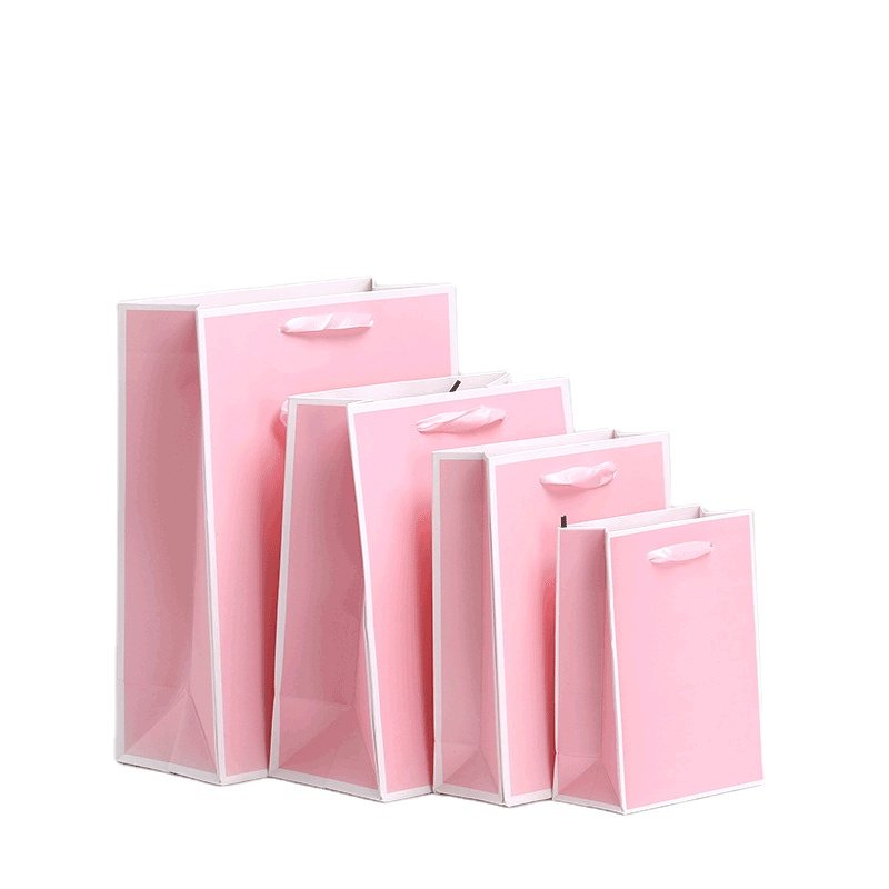 Wholesale Custom Printed Brand Logo Luxury Gift Pink White Black Shopping Packaging Paper Bag With Handles
