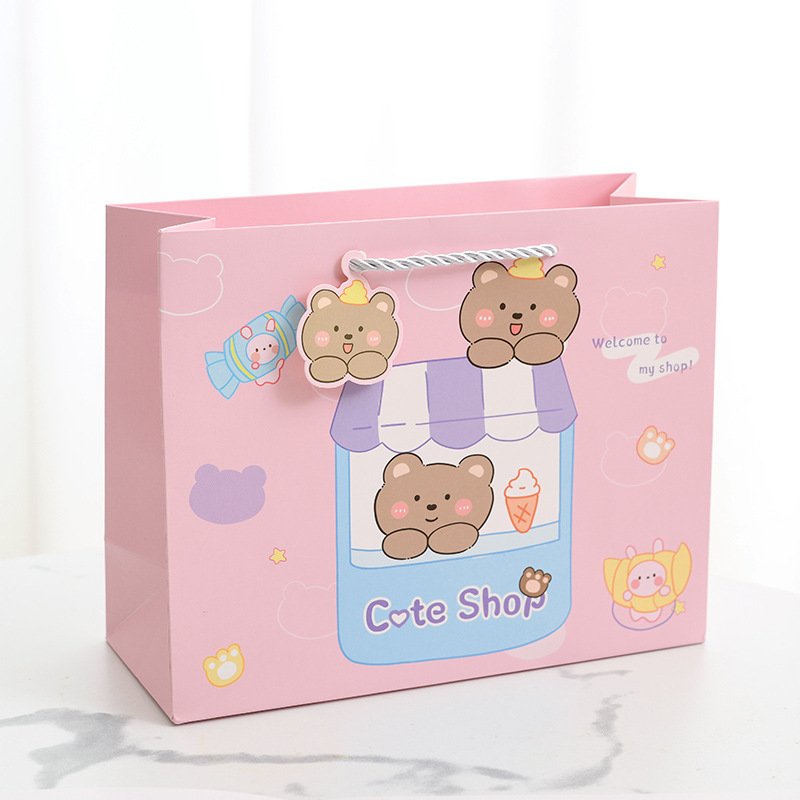 Creative cartoon children's day gift bag boutique with hand bag clothing shopping packaging paper bag