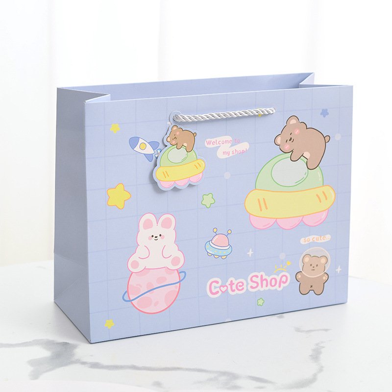 Creative cartoon children's day gift bag boutique with hand bag clothing shopping packaging paper bag