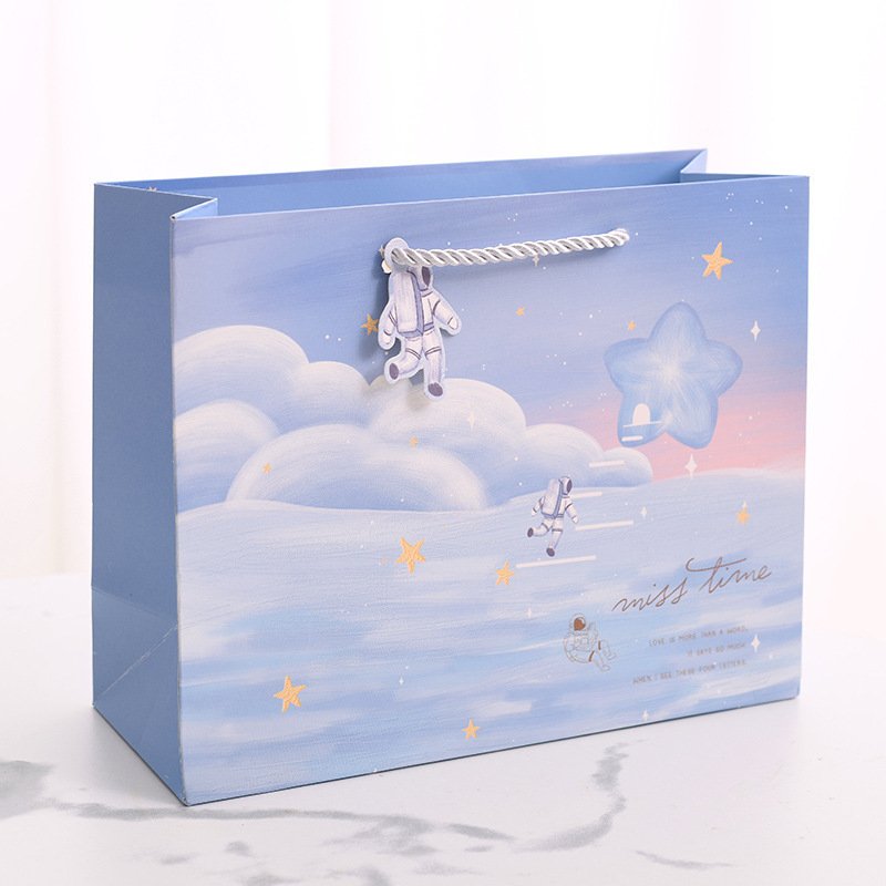 Creative cartoon children's day gift bag boutique with hand bag clothing shopping packaging paper bag