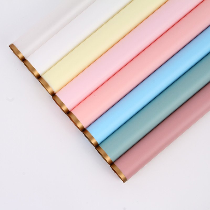 Jixuan 58*58cm Wholesale gold edged flower bouquet waterproof flower packaging paper