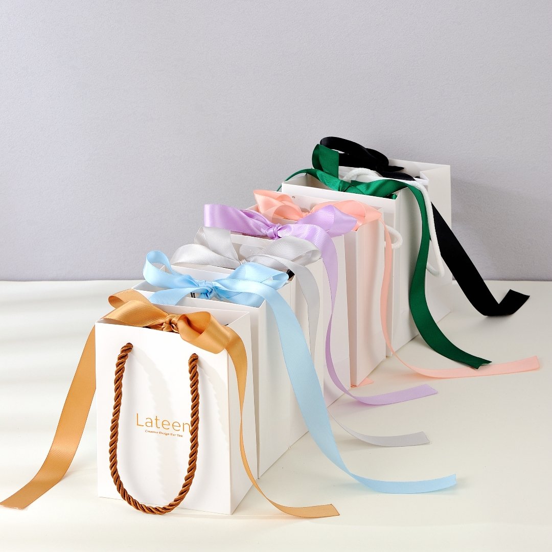 Wholesale Multipurpose Custom Logo Boutique Tote Bag Art Paper Jewelry Packaging Paper Gift Bag With Ribbon Handles