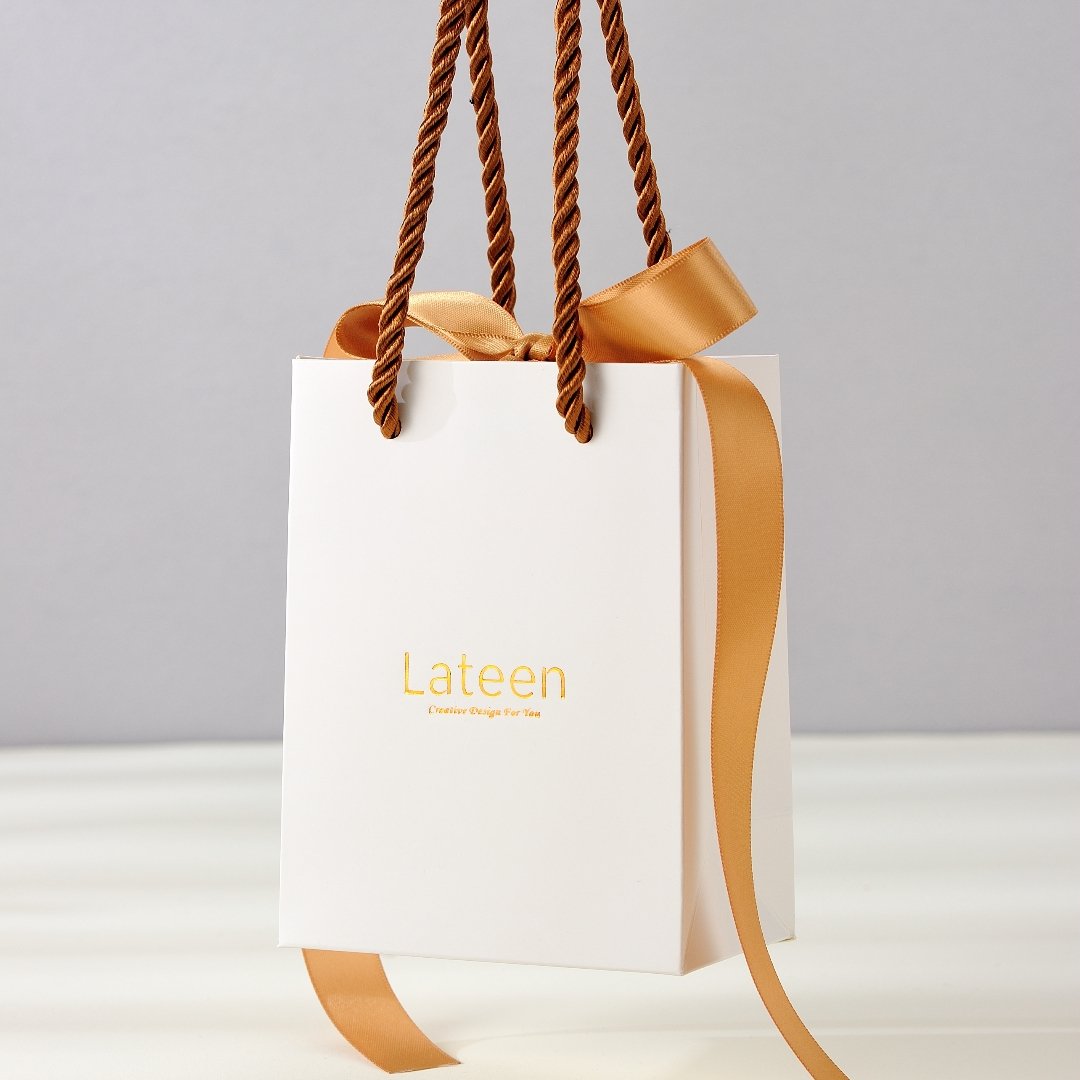 Wholesale Multipurpose Custom Logo Boutique Tote Bag Art Paper Jewelry Packaging Paper Gift Bag With Ribbon Handles