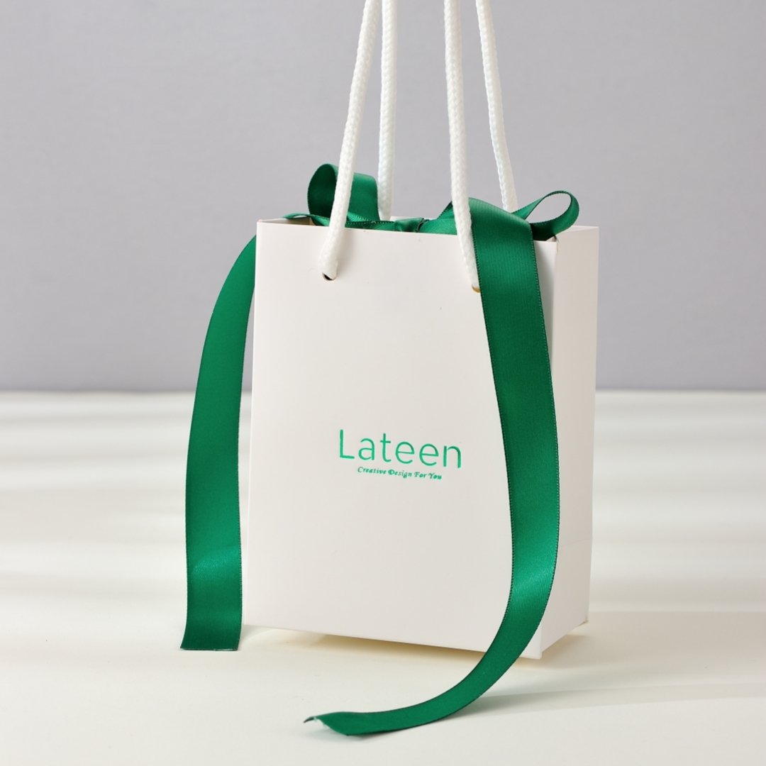 Wholesale Multipurpose Custom Logo Boutique Tote Bag Art Paper Jewelry Packaging Paper Gift Bag With Ribbon Handles