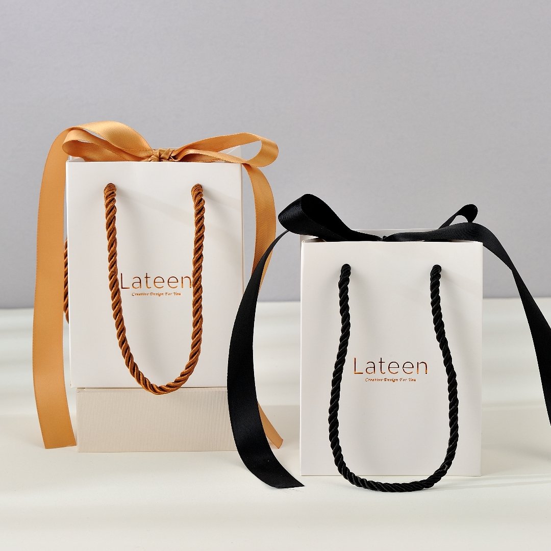 Wholesale Multipurpose Custom Logo Boutique Tote Bag Art Paper Jewelry Packaging Paper Gift Bag With Ribbon Handles