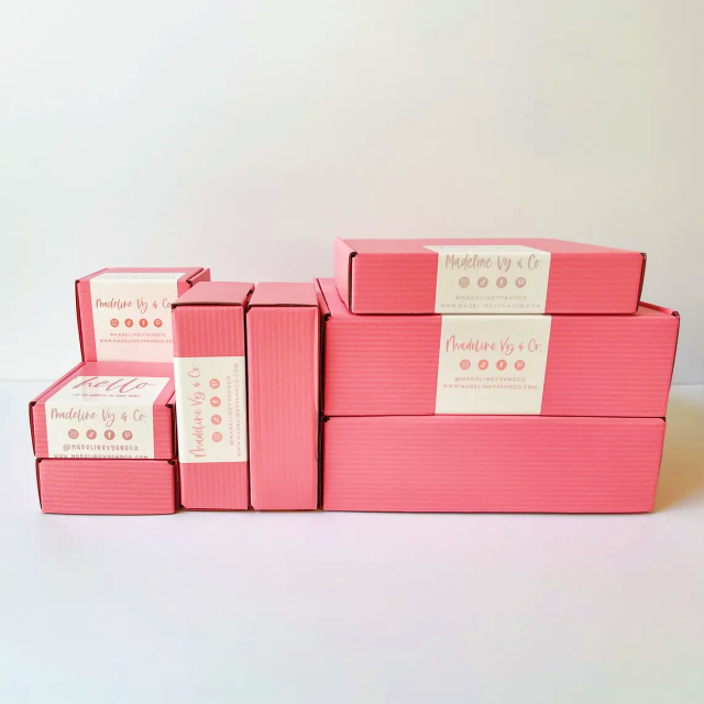Customized logo corrugated cosmetic packaging pink foldable transport paper box