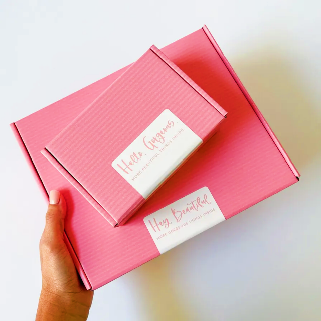 Customized logo corrugated cosmetic packaging pink foldable transport paper box