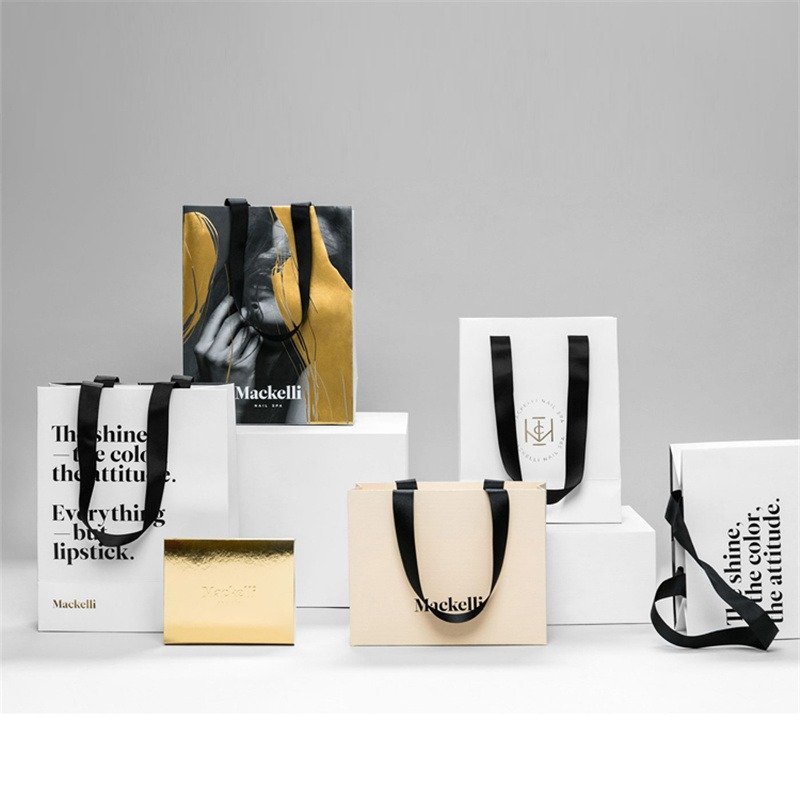 Wholesale Custom Printed Brand Logo Design Promotion Luxury Gift Shopping Embossing Paper Bag With Handle For Crafts Packaging