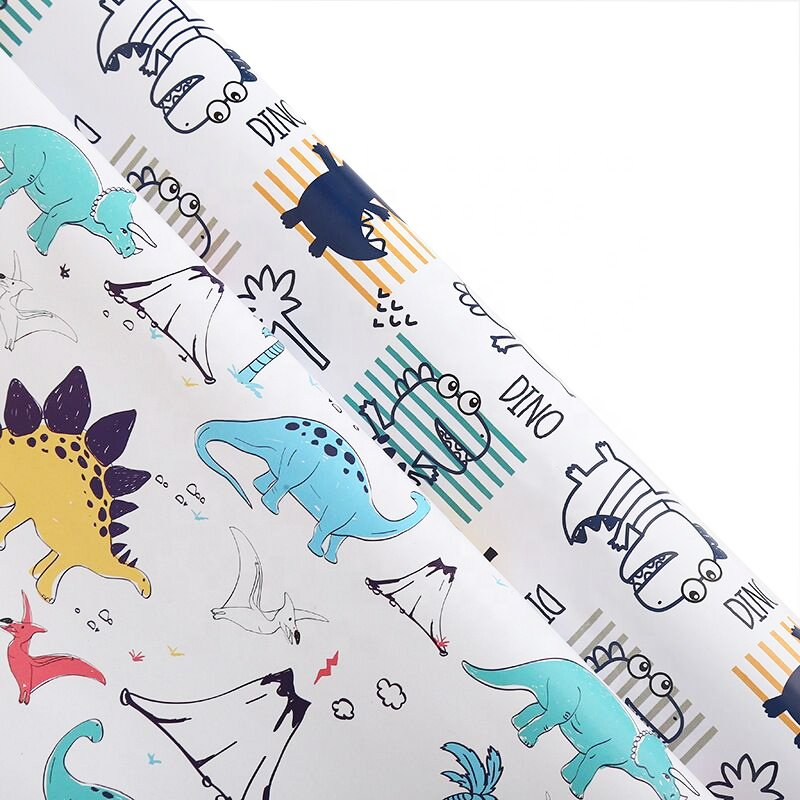 Wholesale Spot cheap spot 80 grams of coated paper boy dinosaur pattern gift paper 50x80cm