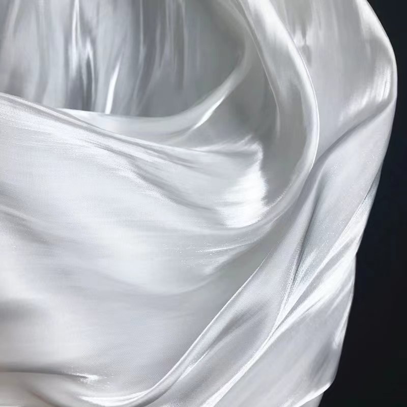 High quality Shiny liquid organza fabric 20D*50D 59 gsm light weight satin fabric clothing fabric for garment