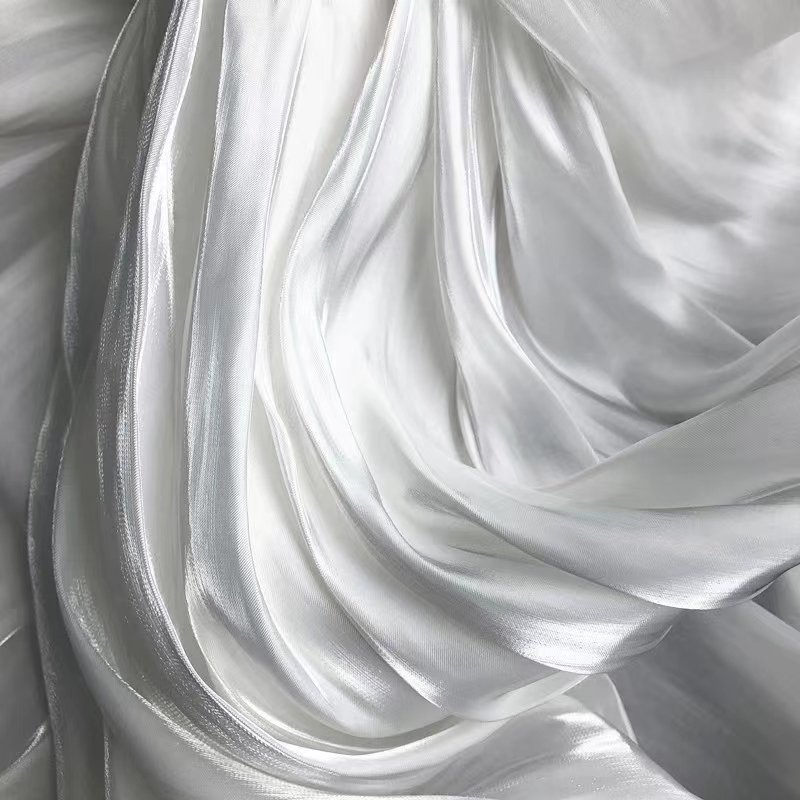 High quality Shiny liquid organza fabric 20D*50D 59 gsm light weight satin fabric clothing fabric for garment