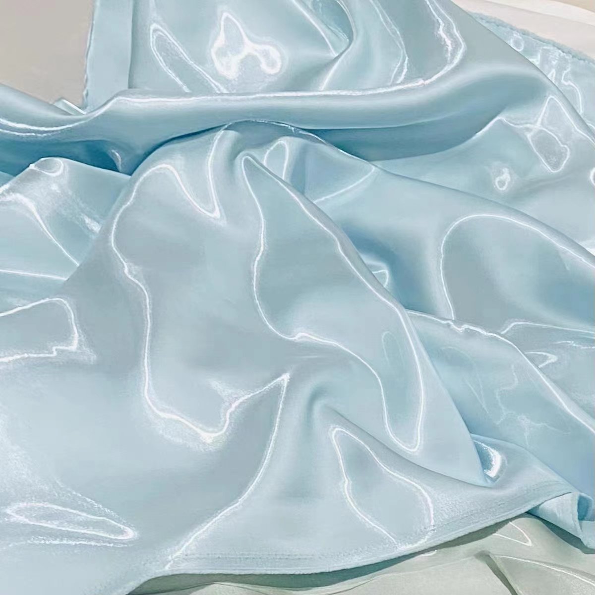 High quality Shiny liquid organza fabric 20D*50D 59 gsm light weight satin fabric clothing fabric for garment