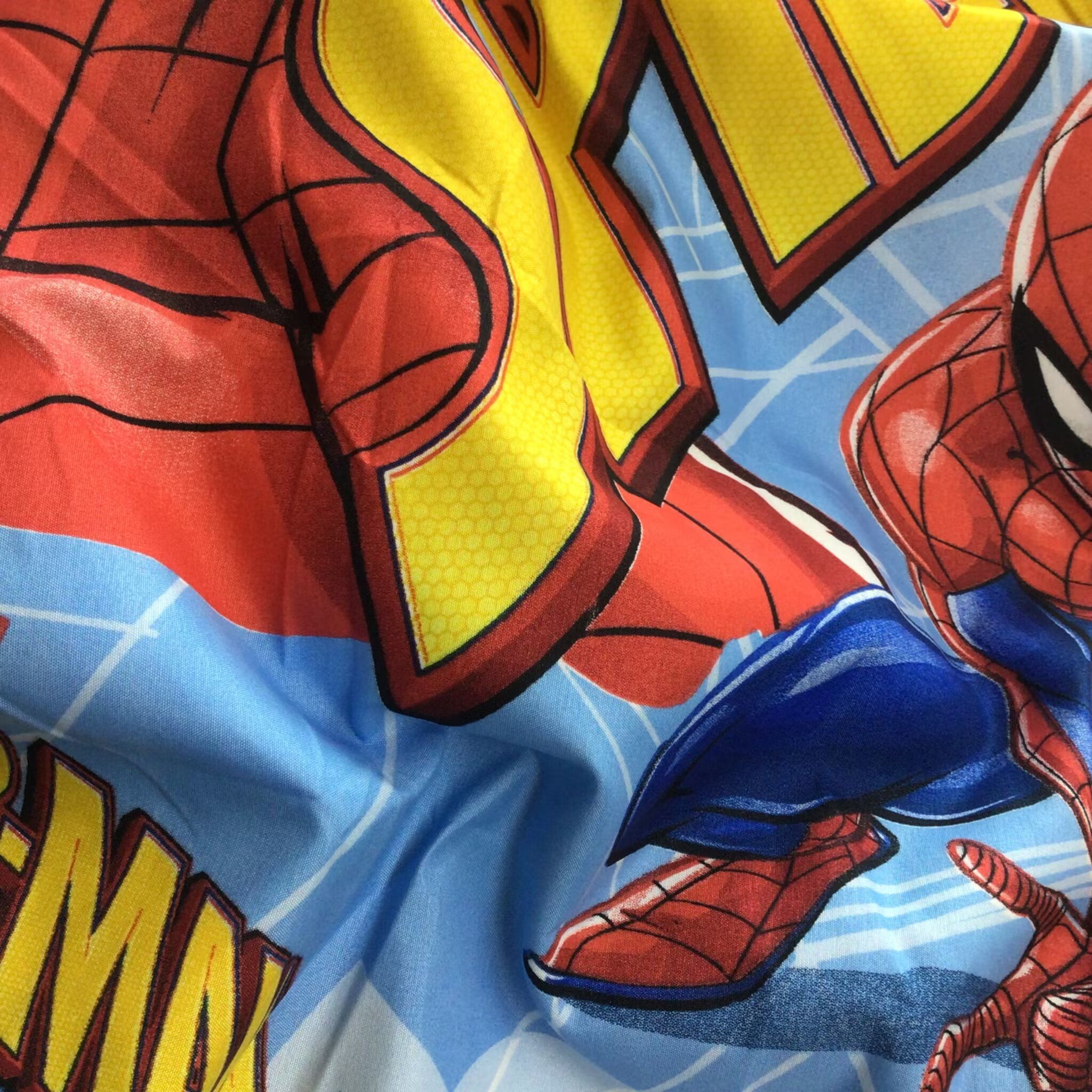 Hot sale Spiderman cartoon design children bed sheet fabric microfiber pigment printed fabric peach skin fabric