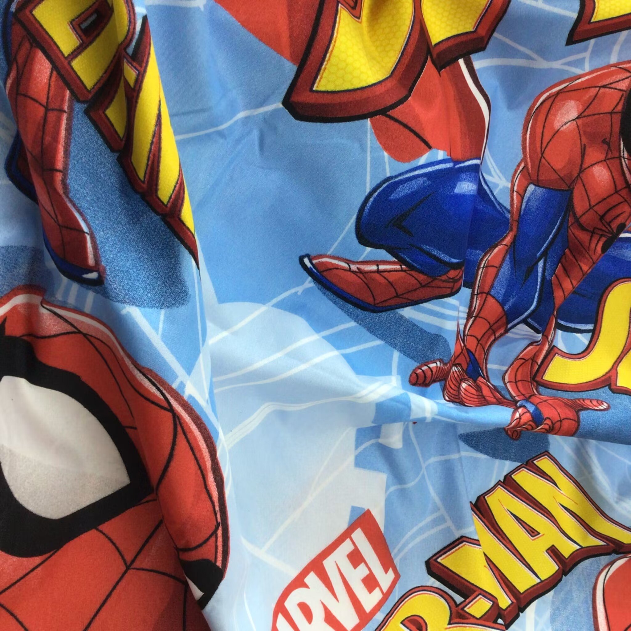 Hot sale Spiderman cartoon design children bed sheet fabric microfiber pigment printed fabric peach skin fabric