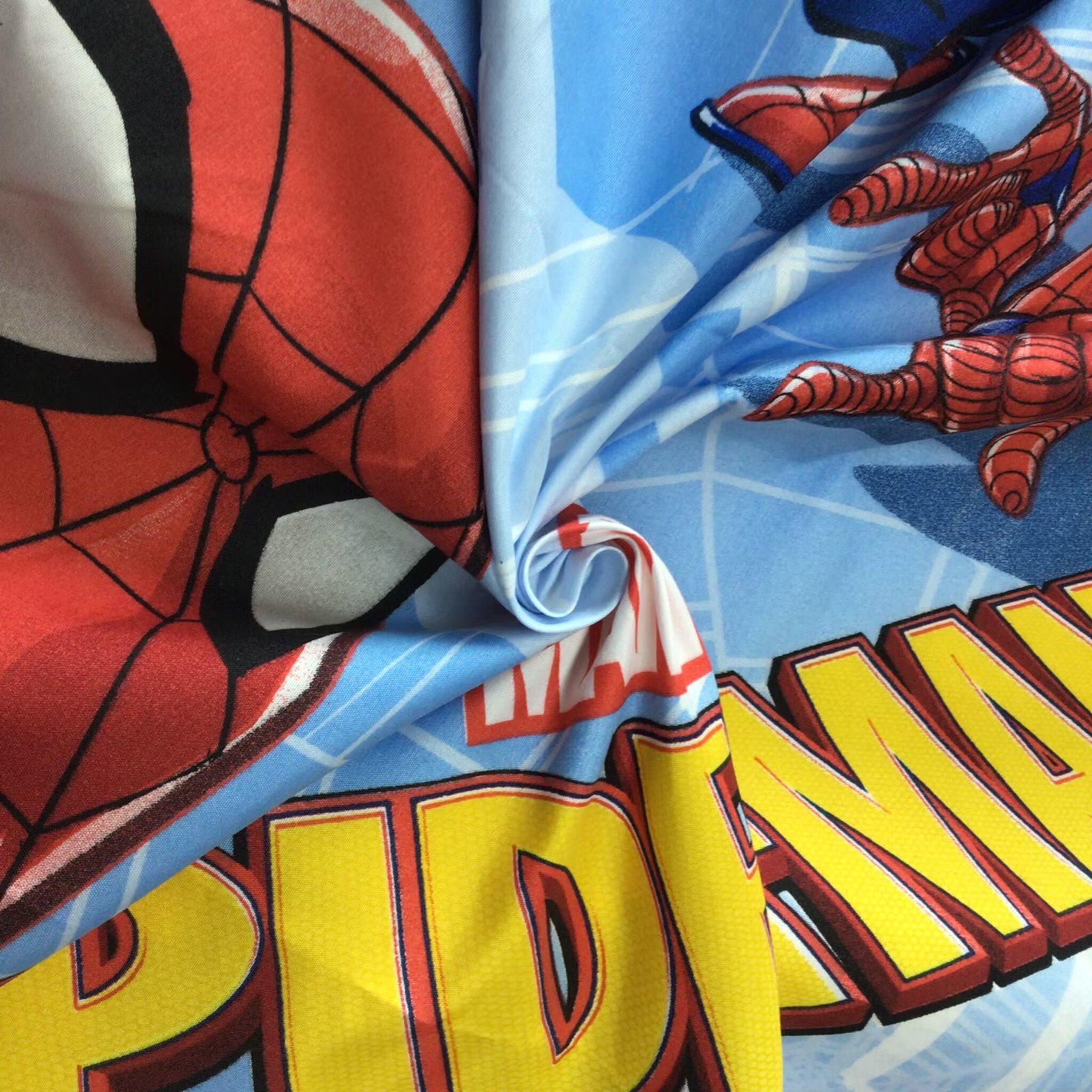 Hot sale Spiderman cartoon design children bed sheet fabric microfiber pigment printed fabric peach skin fabric