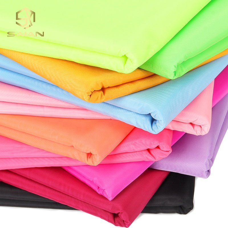 High Quality 82 Colors 100% Polyester Memory Composite Luxury Fabric Lining Fabric Canvas Fabric For Bag Making