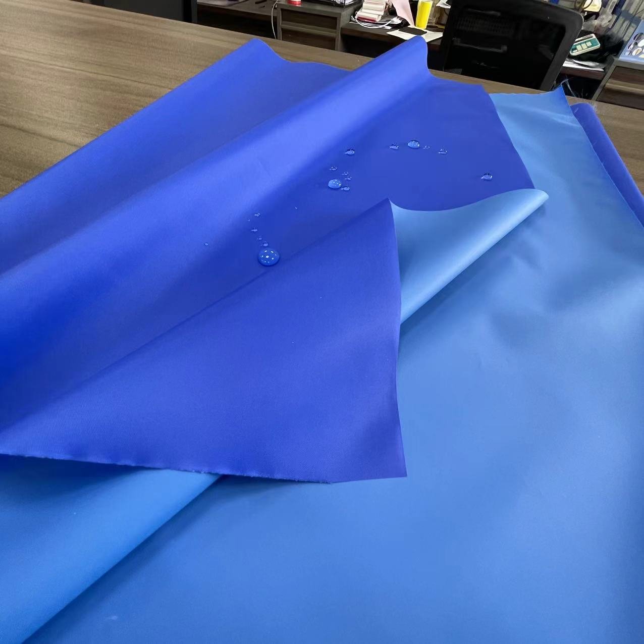Dorectly factory price good quality PVC coating Taffeta raincoat material fabric