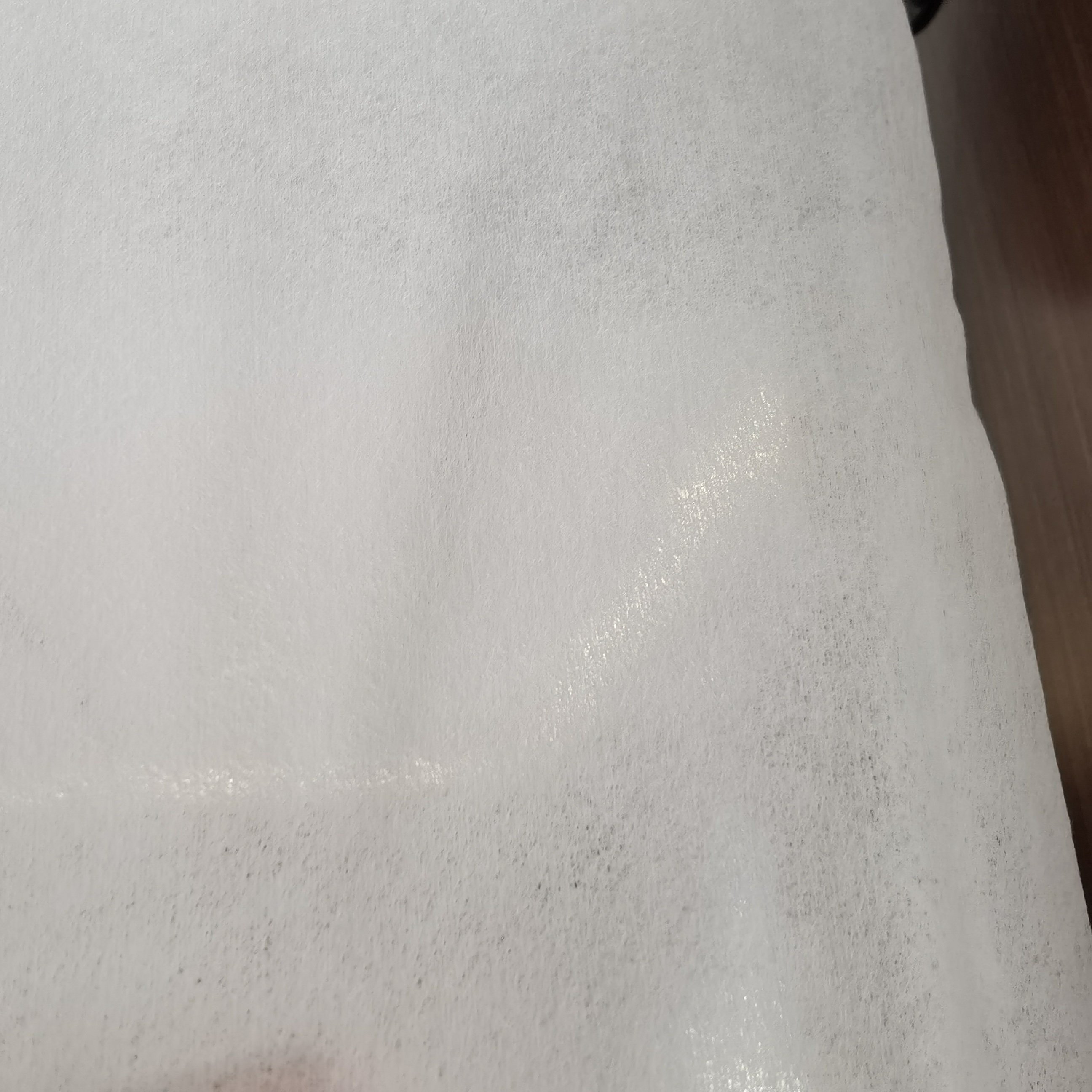 Plain Customized Cotton Spunlace NonwovenParallel Cross Pearl Spunlace Nonwoven Fabric For Washcloth Jumbo Rolls